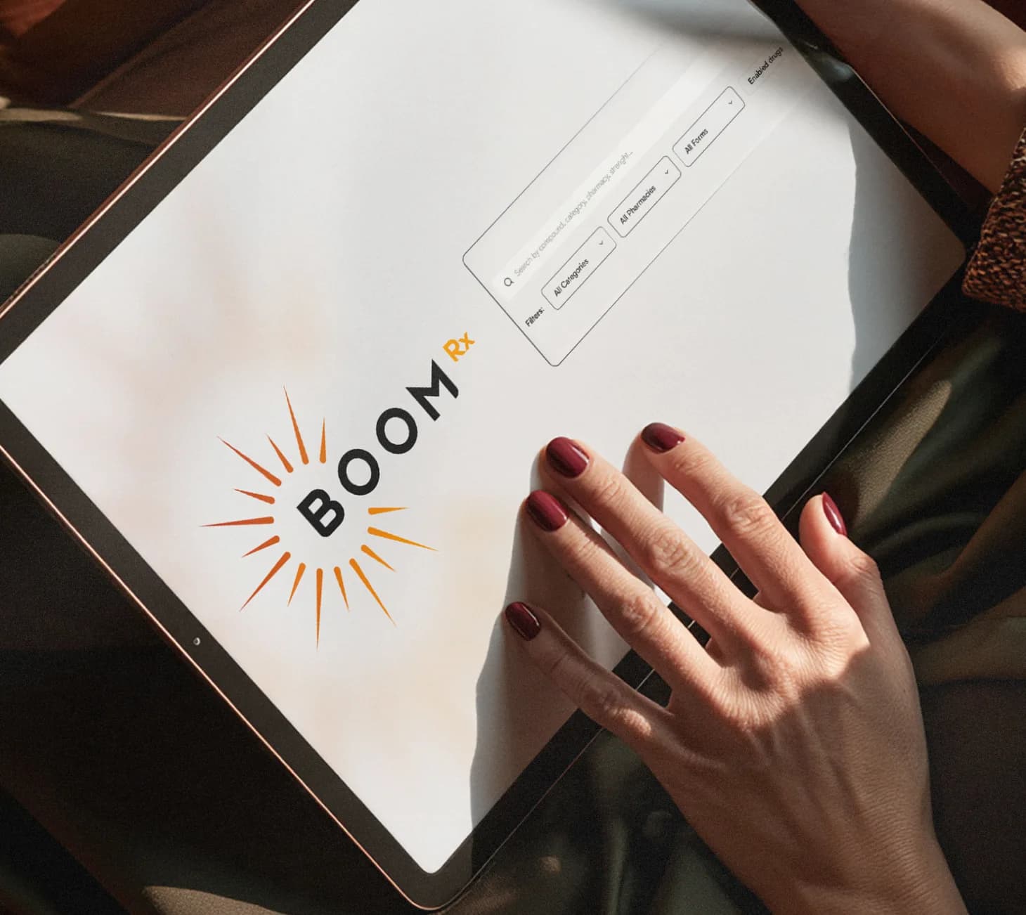 A tablet showing the BoomRx product search